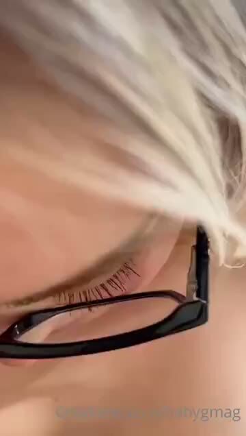 Mature White-Haired Granny Close Up in Glasses