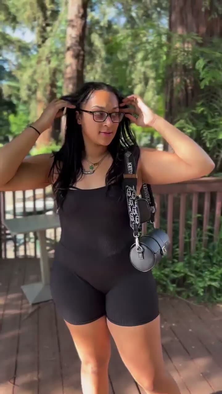 Curvy Latina in Tight Black Bodysuit Outdoors