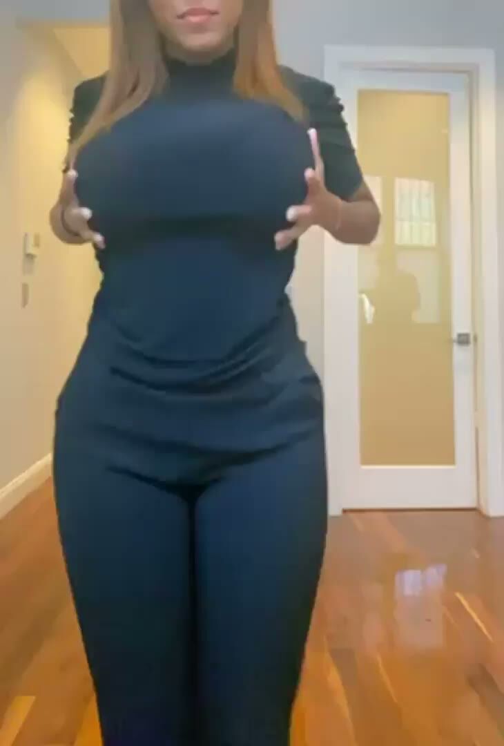 Curvy Brunette MILF Squeezes Massive Boobs in Tight Dress