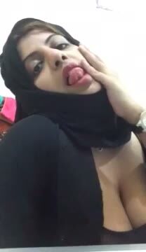 Busty Arab Hijabi Teases With Tongue Out
