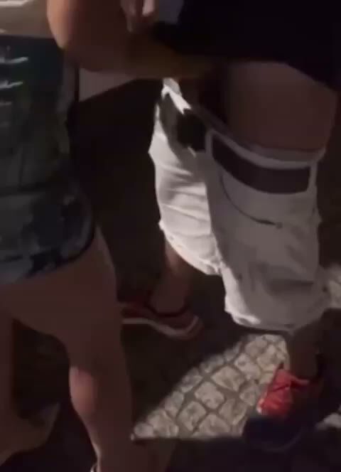 Amateur Couple Standing Close Outdoors in Shorts