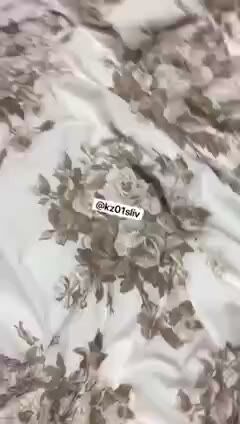 Floral Bed Sheets Closeup on Rumpled Mattress