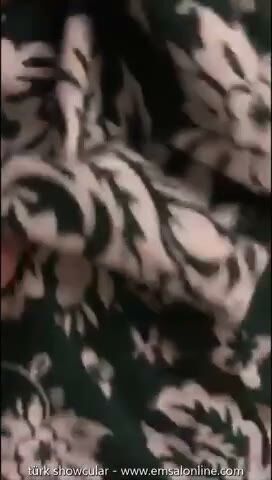 Brunette in Floral Dress Tease