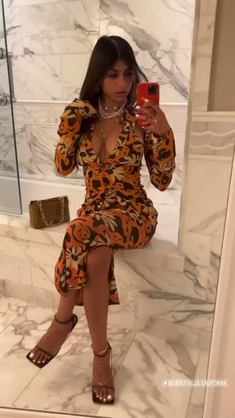 Mia Khalifa Curvy Brunette in Tight Dress Bathroom Selfie