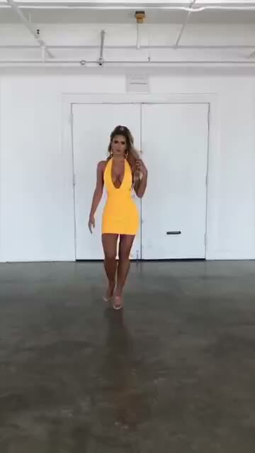 Busty Curvy Blonde Teases in Tight Yellow Dress