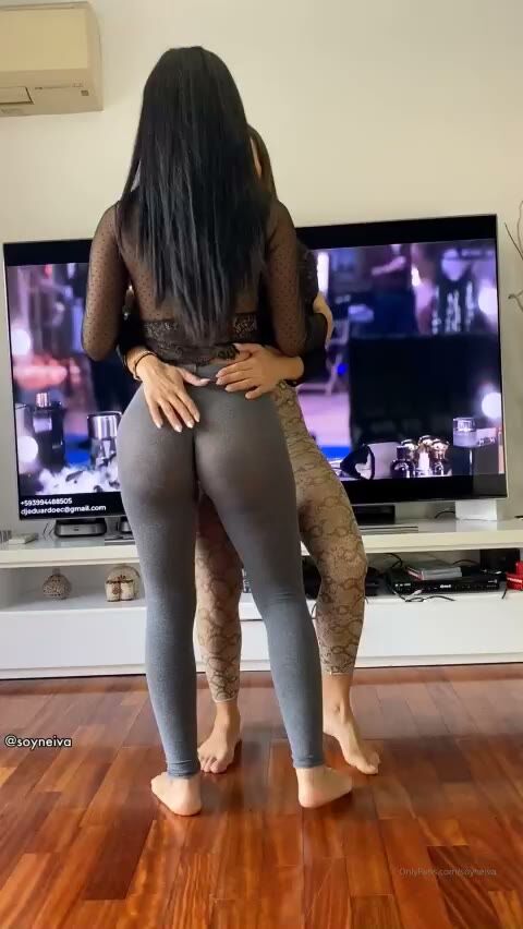Two Curvy Latina Brunettes Grab Big Asses