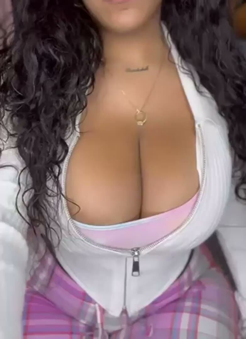 Busty Curvy Brunette Shows Massive Cleavage in Hoodie