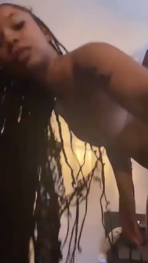 Tattooed Ebony Babe Exposes Her Natural Boobs