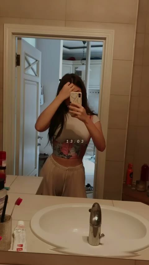 Petite Brunette Teen Takes Bathroom Mirror Selfie