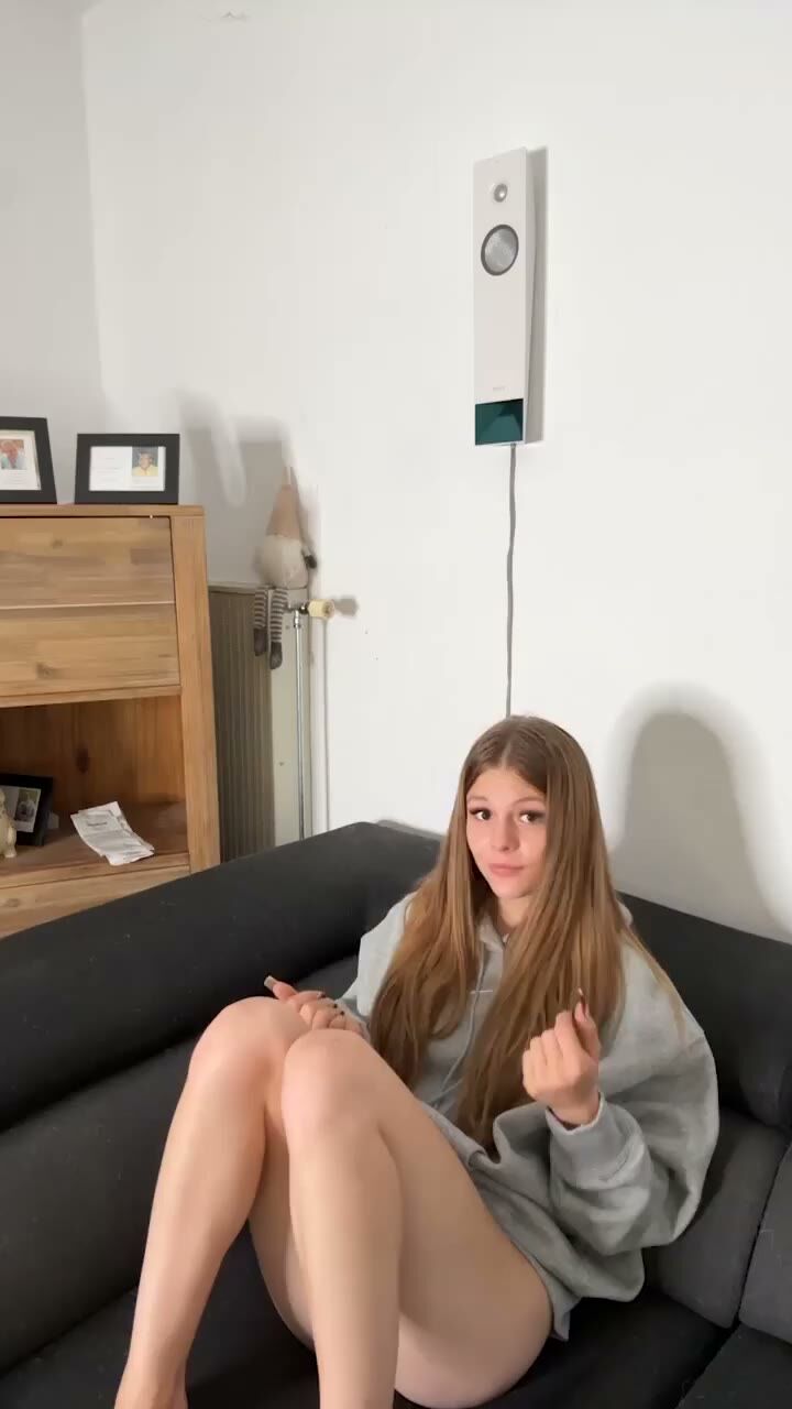 Petite Brunette Teen Poses Barelegged on Couch