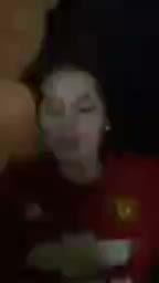 Petite Asian Teen in Red Jersey Smiles Seductively