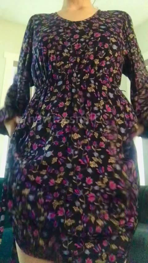 Curvy BBW in Floral Dress Shows Curves