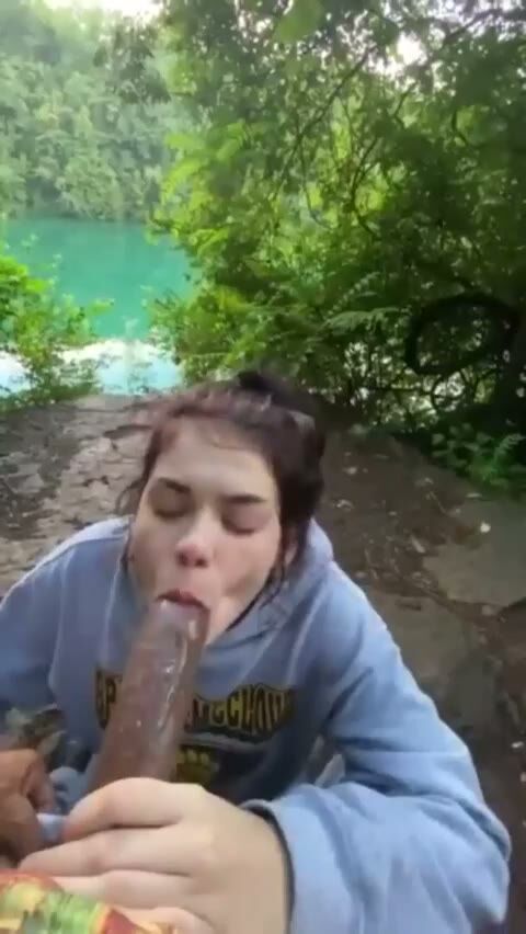 Brunette Teen Sucks Huge Dildo Outdoors by Lake