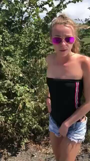 Blonde Amateur Teases Outdoors in Denim Shorts