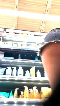 Dark Skinned Amateur in Public Store Aisle