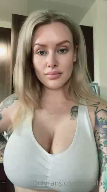 Busty Blonde Tattooed OnlyFans Model Shows Cleavage