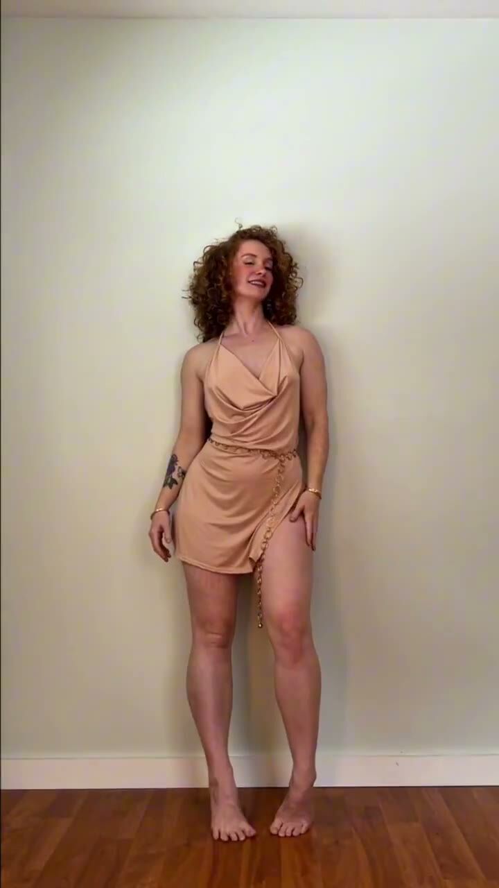 Redhead Babe Dances in Short Dress