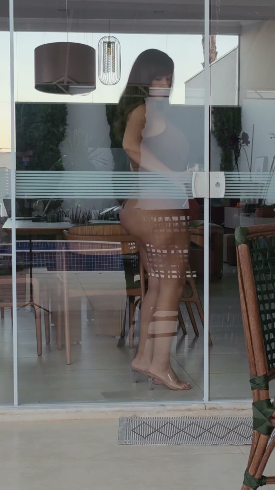 Brunette Teases in Tight Bodysuit