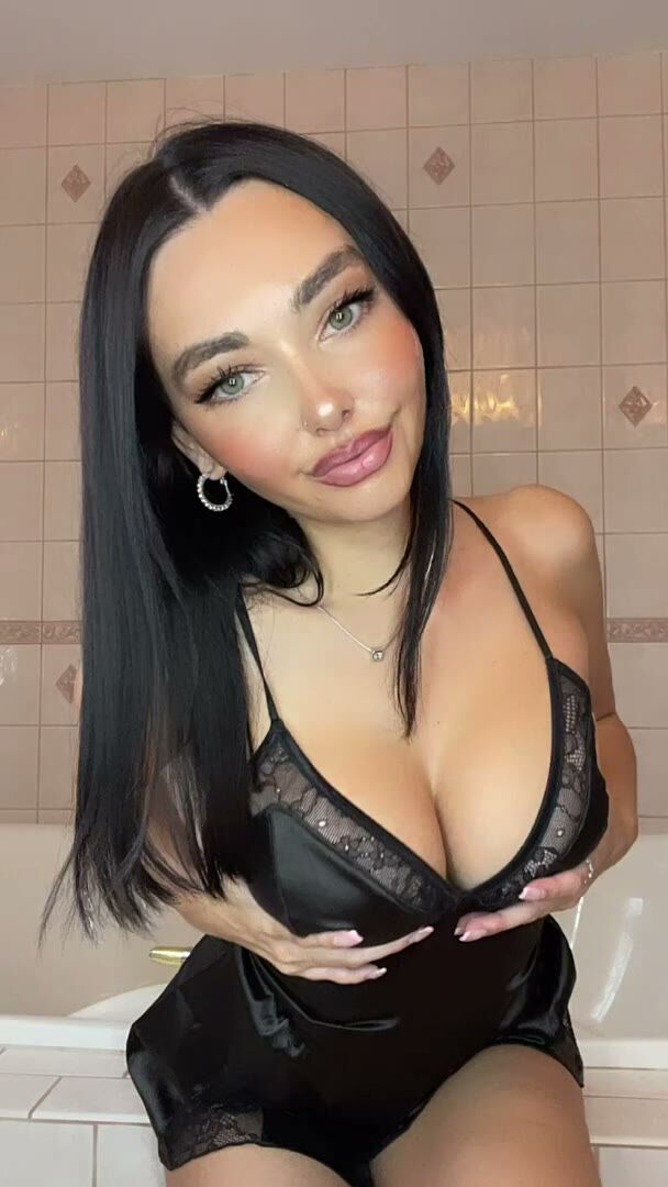 Busty Brunette Lingerie Tease in Bathroom