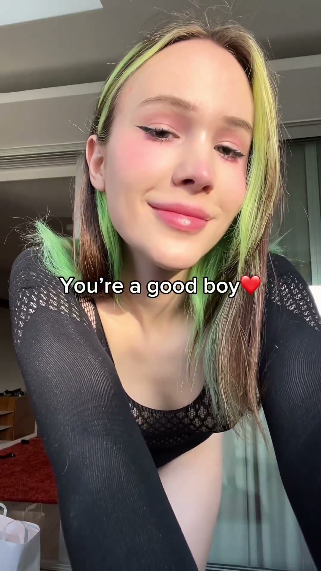 Green-haired Femboy Teases in Sheer Bodysuit