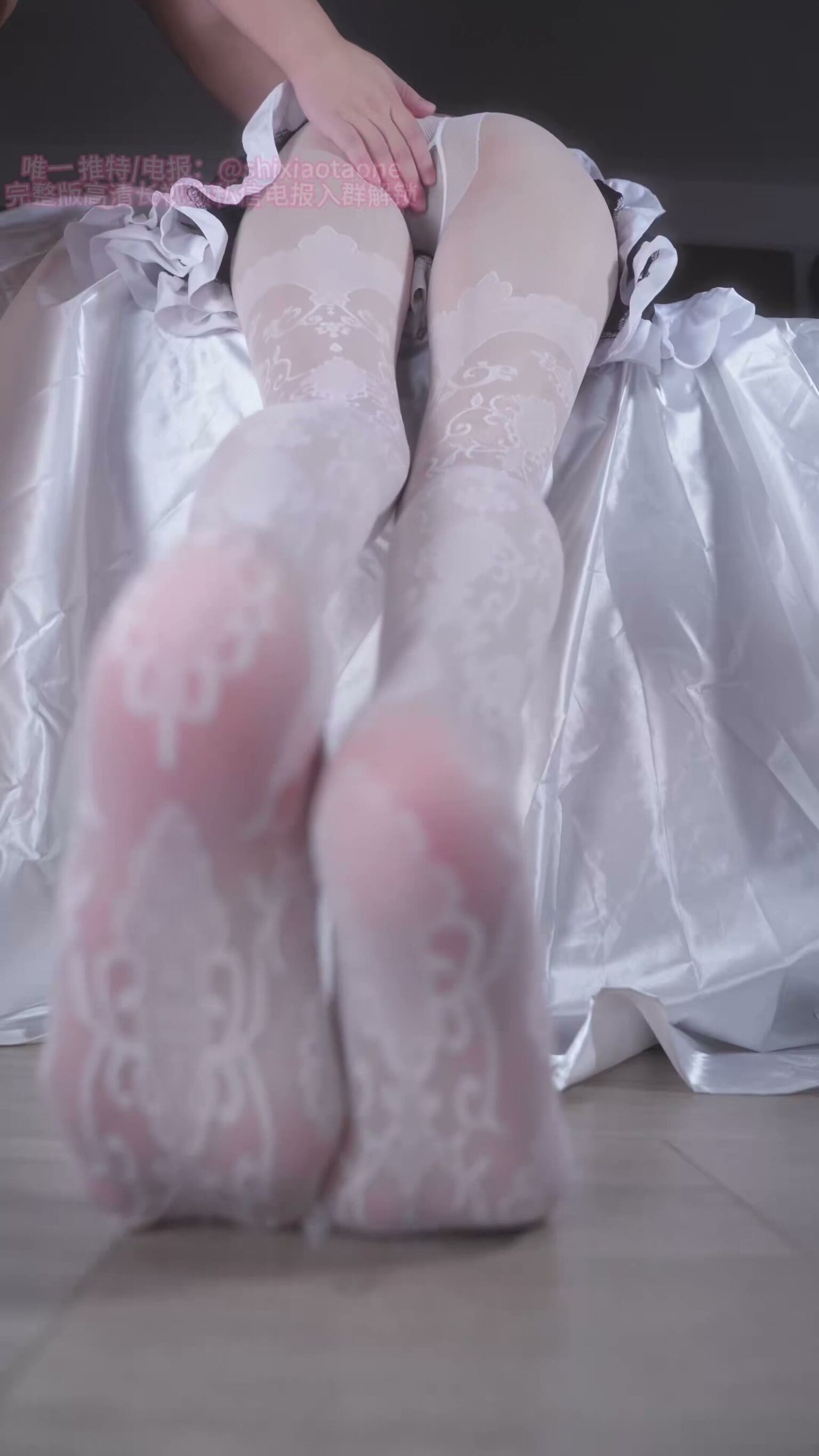 Asian Babe in Lace Stockings Shows Soles