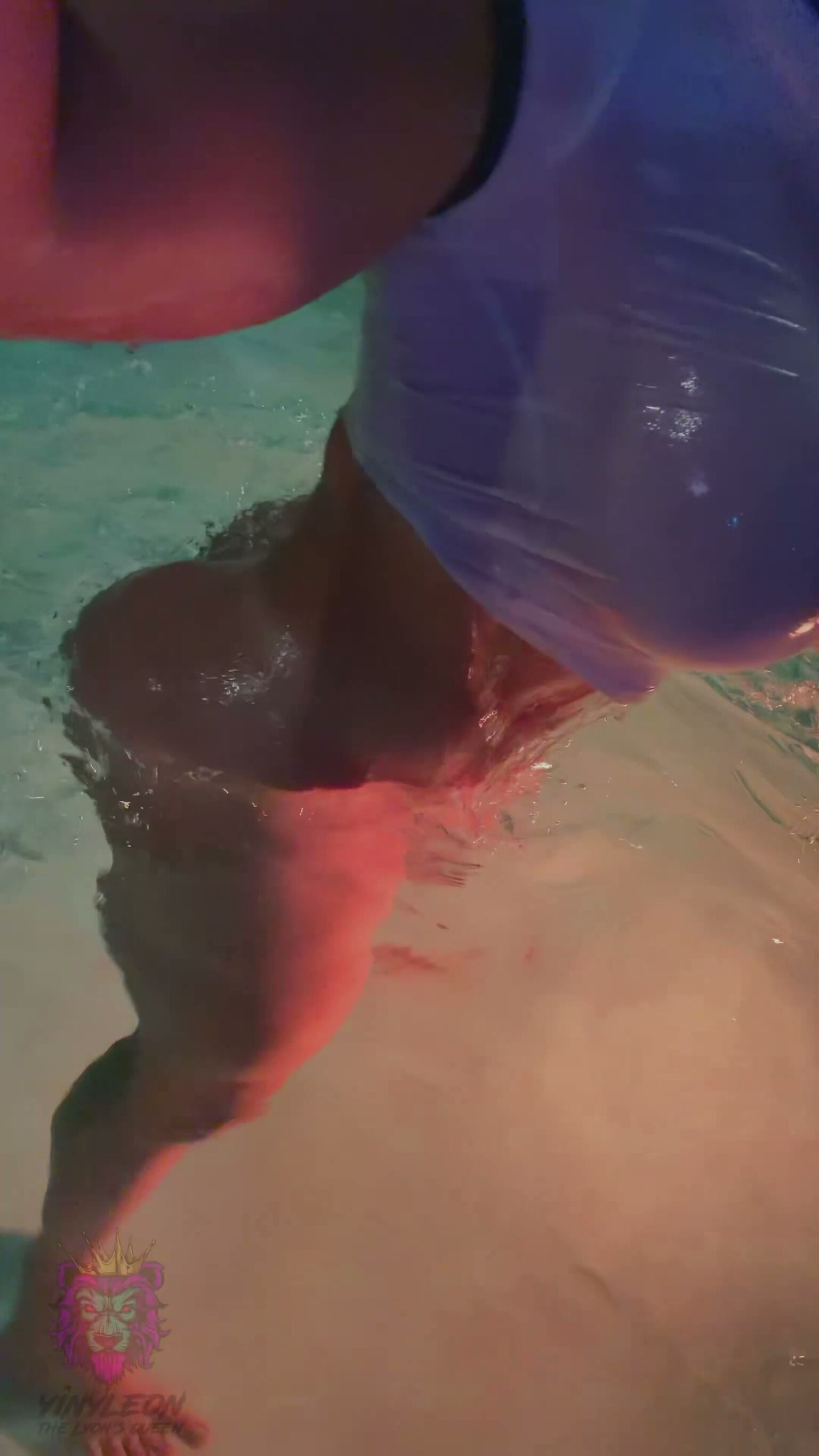 Curvy Brunette Twerks in Neon Pool
