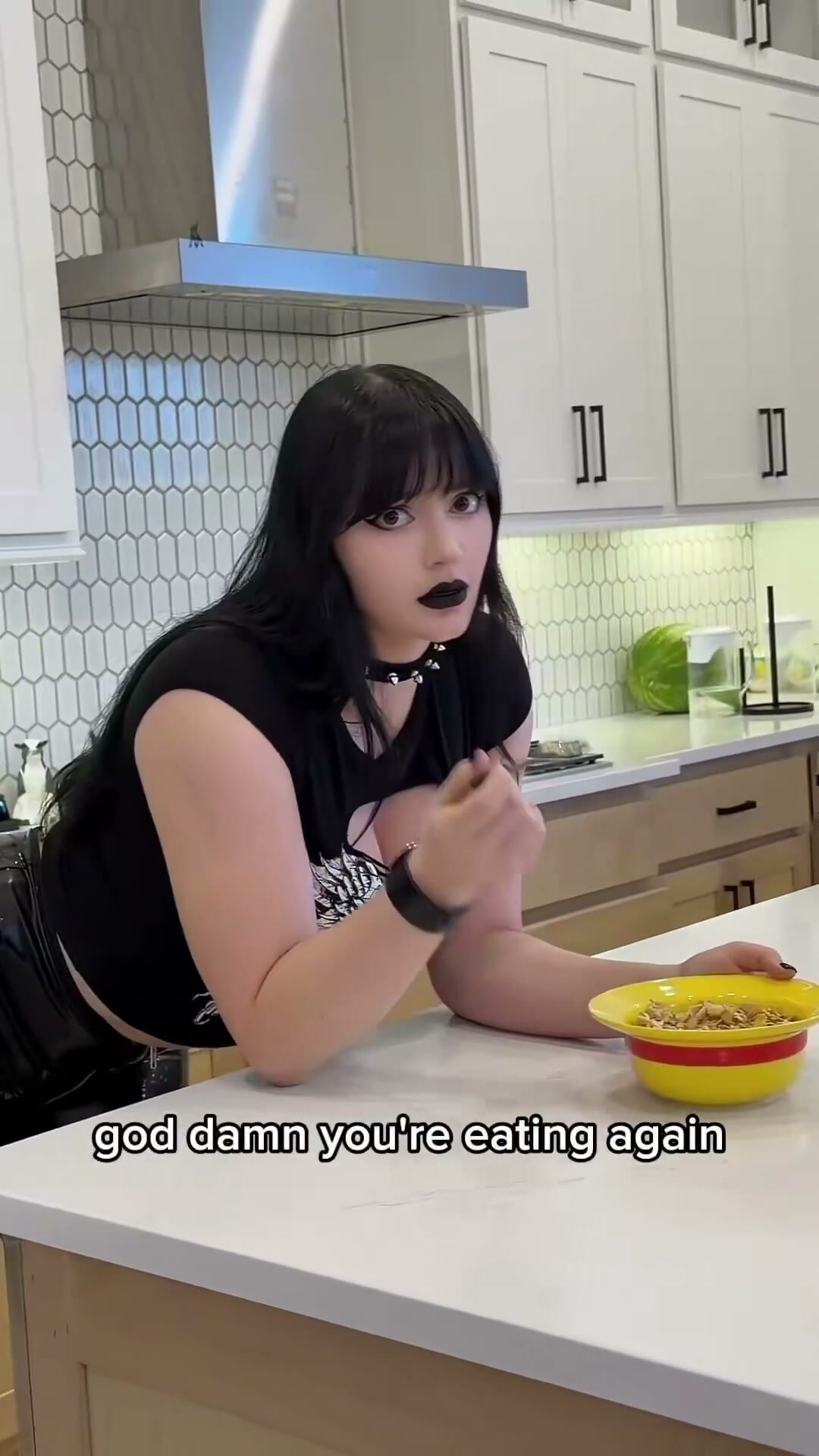 Curvy Black-Haired Babe Shows Off in Kitchen