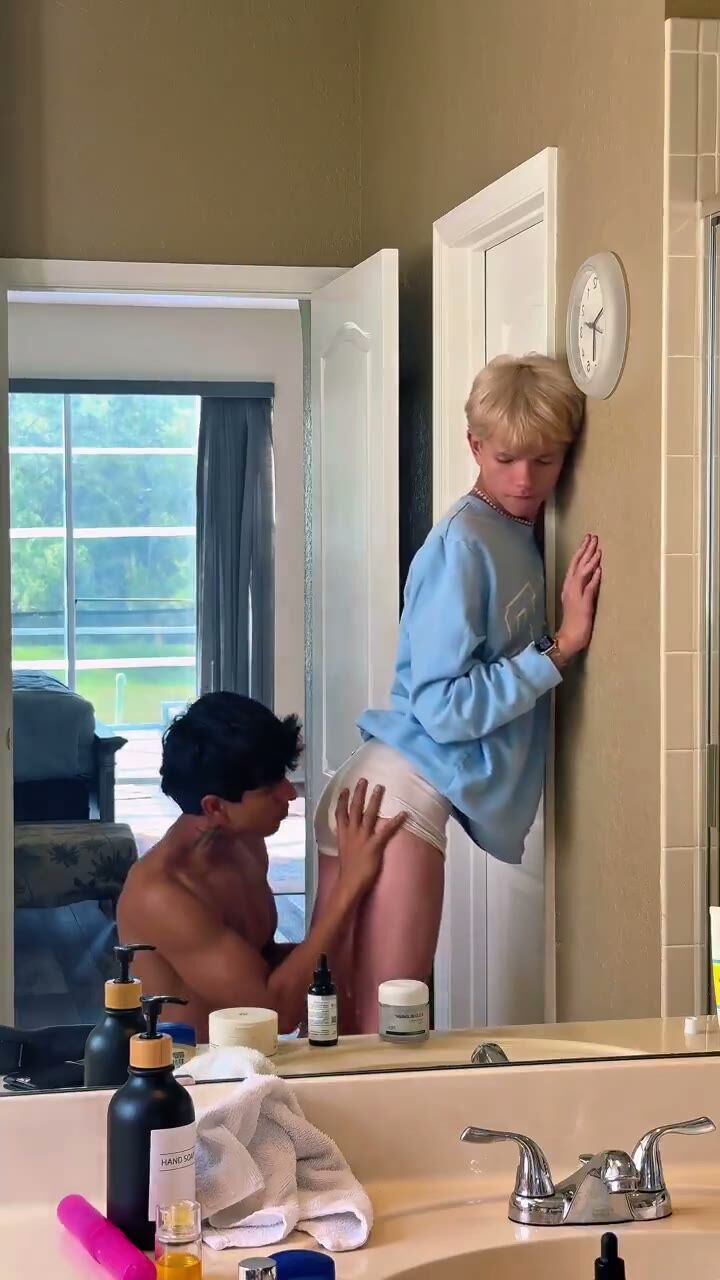 Muscular Stud Rims Blonde Twink in Bathroom
