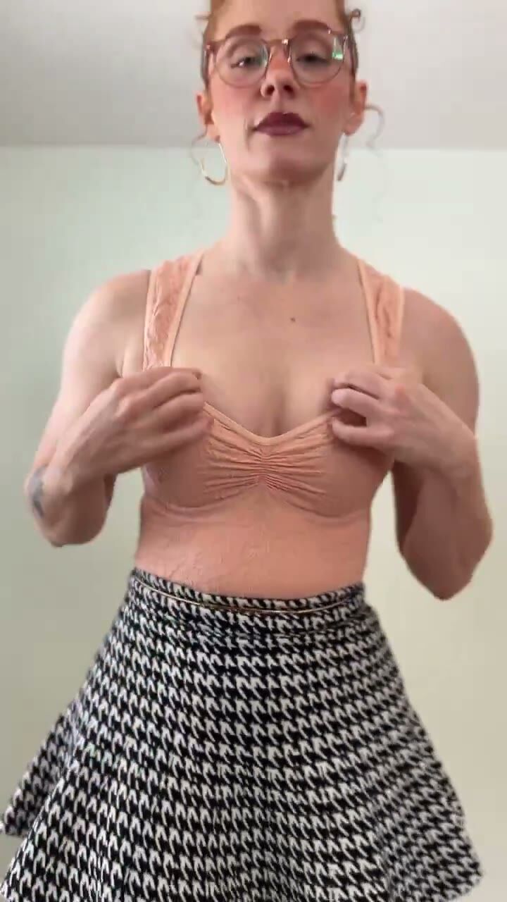 Curvy Redhead Teases in Lace Top and Skirt