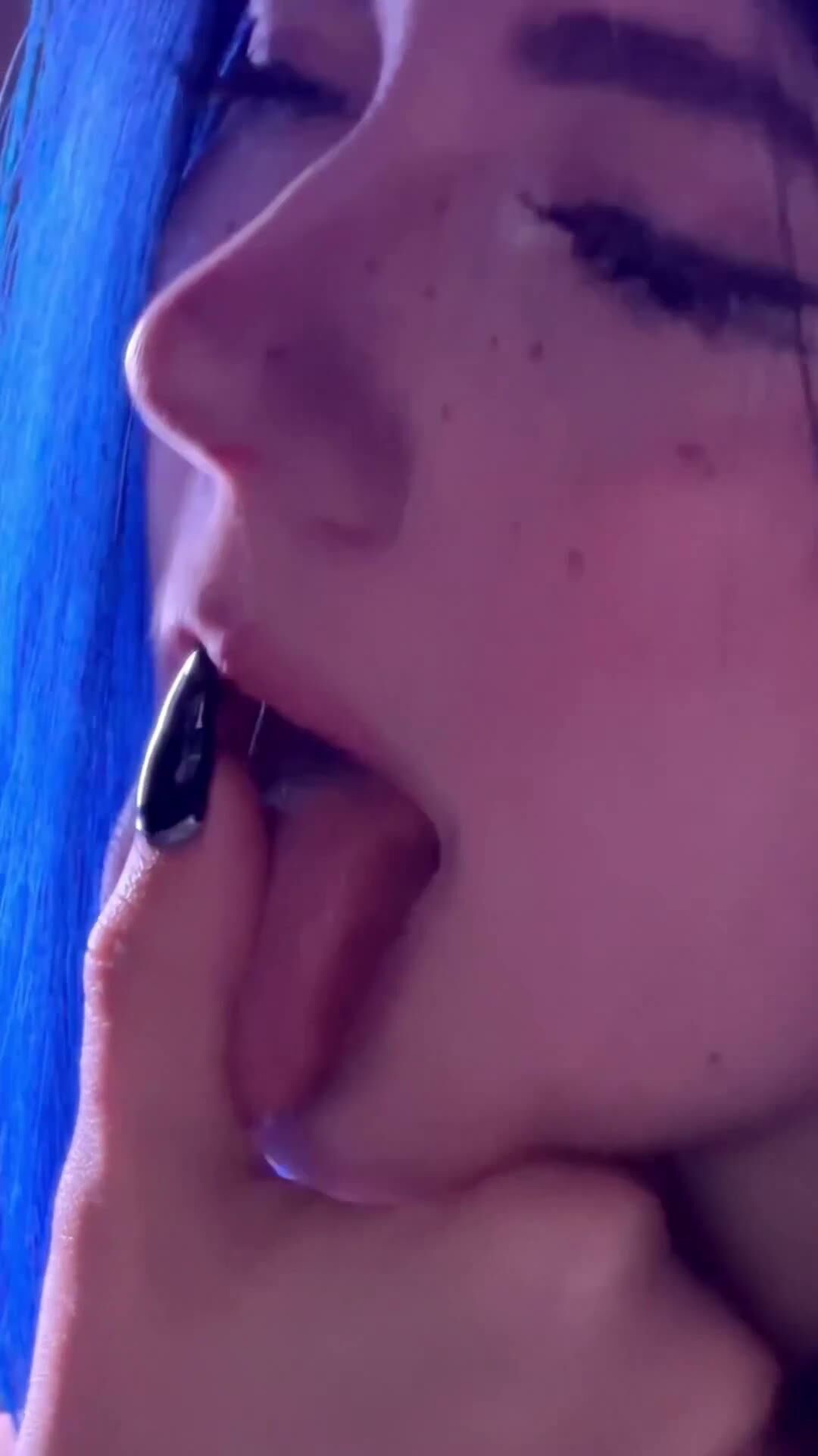Busty Blue-Haired Babe Sucks Fingers Sloppily