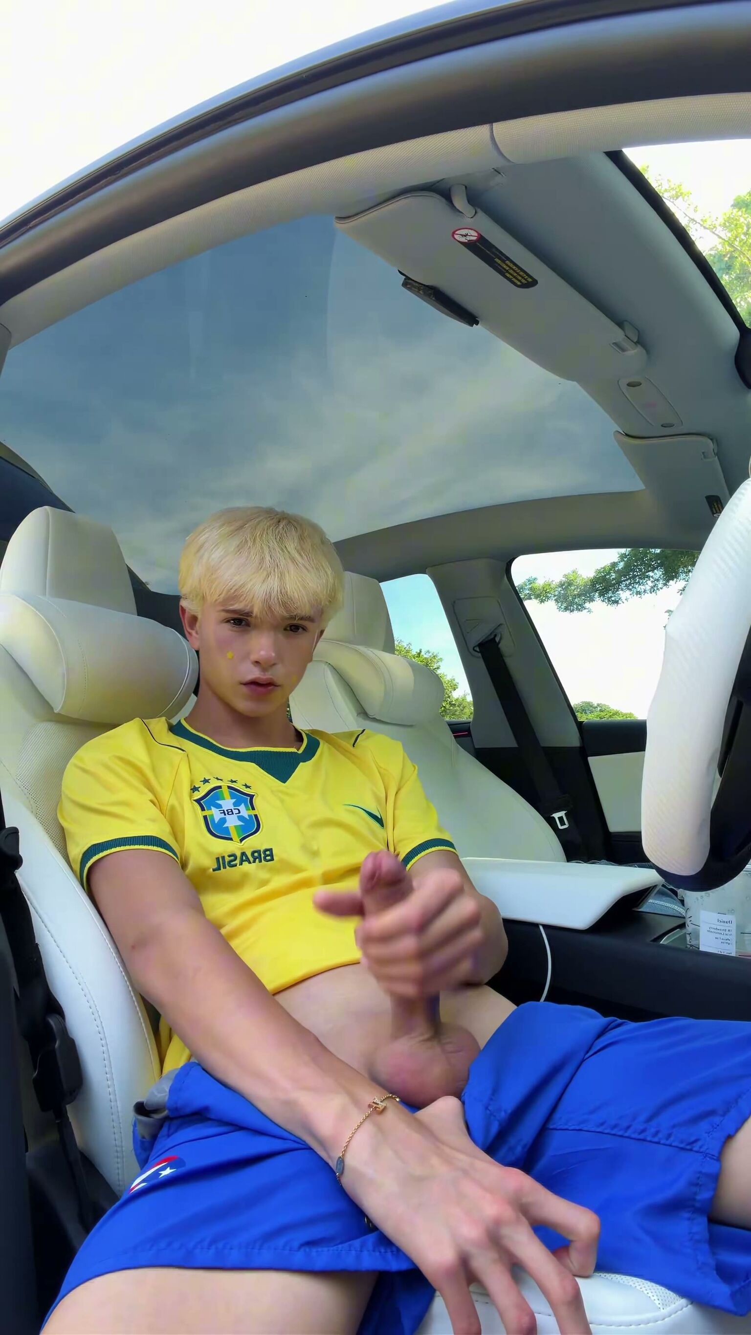 Blonde Femboy Strokes Cock in Car